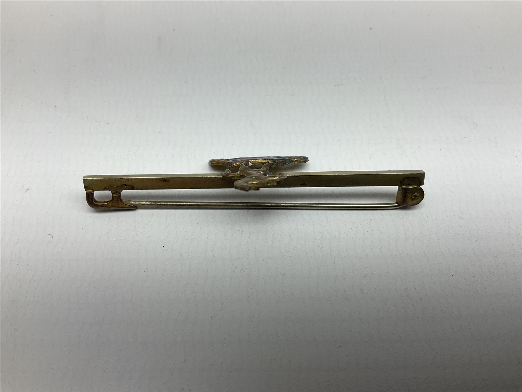 Royal West Kent regiment 9ct gold and enamel sweetheart brooch; The Queens Own regiment silver and enamel sweetheart brooch; and another sweetheart brooch for the Royal West Kent regiment (3)