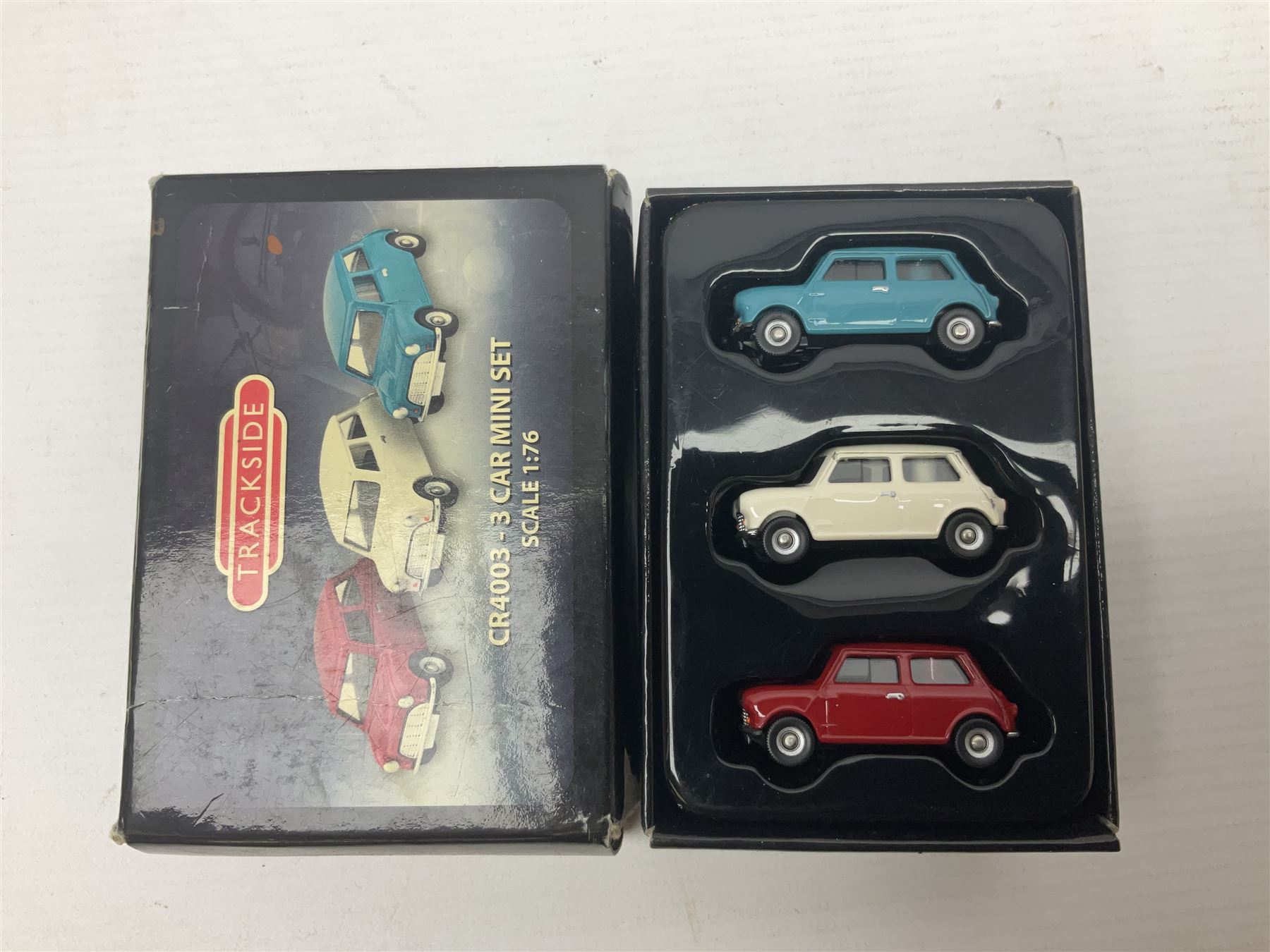 Over forty 1:76 scale die-cast models of cars and commercial vehicles; some boxed; and eight small scale models of motorcycles; all unboxed