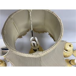 Collection of Aynsley Orchard Gold pattern wares, comprising lamp base, three jars and covers, six vases or various size and form, large jug, lidded dish, pair of cruets, pair of candlesticks, mug, two pin dishes, lobed dish, tea cup, saucer, size plate, and cake plate, and two further cups and saucers, each cup decorated with central Orchard Gold reserve to the interior against a mottled pink or green ground. 