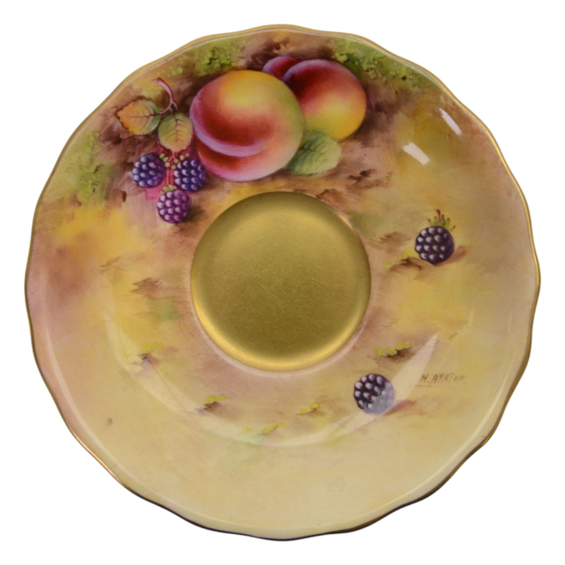 Royal Worcester fruit painted cabinet teacup and saucer, interior hand painted with apples, blackberry and cherries upon a mossy ground, the cup exterior and centre of saucer gilded, cup and saucer signed Rickells, each with puce coloured printed marks beneath, H7cm