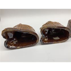 Set of four 19th century treacle glaze furniture/sash window rests modelled as lions, H9.5cm