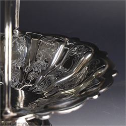 Edwardian silver swing handled basket, of circular form with shaped rim and engraved floral and foliate decoration, with know design swing handle and upon circular stepped pedestal, hallmarked J Sherwood & Sons, Birmingham 1901, H9cm, D22cm