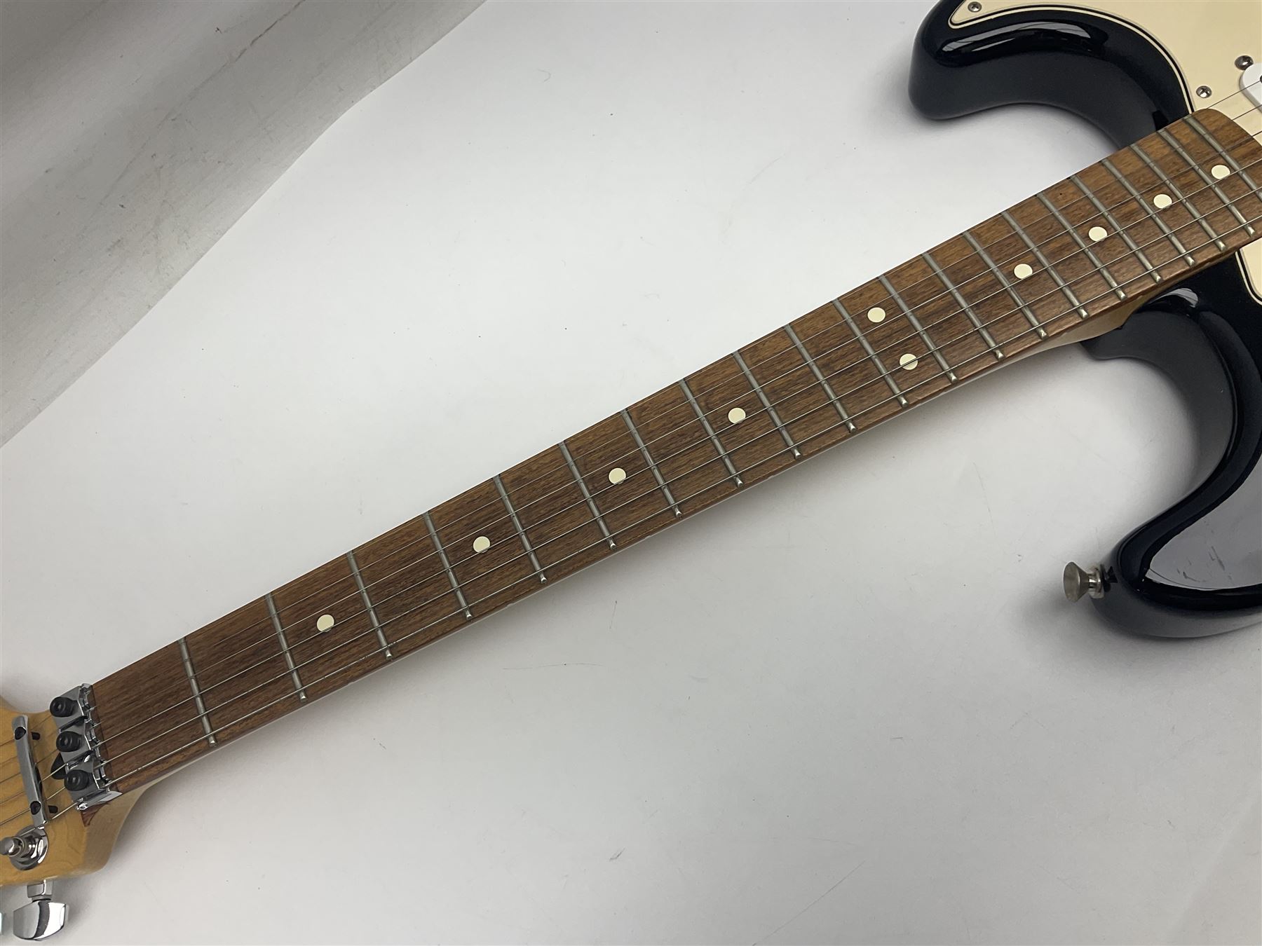 Mexican Fender Stratocaster electric guitar in black c2003 with Floyd Rose tremolo system, serial no.MZ3129600; L98cm; in Freestyle fitted case with 2006 Diamond Anniversary booklet