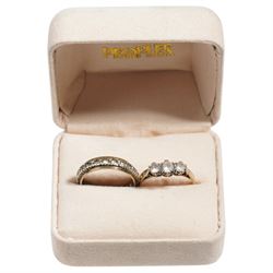 Gold white spinel full eternity ring and a three stone white spinel ring, both 9ct