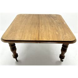 19th century mahogany telescopic extending dining table, moulded top, turned supports on brass castors 