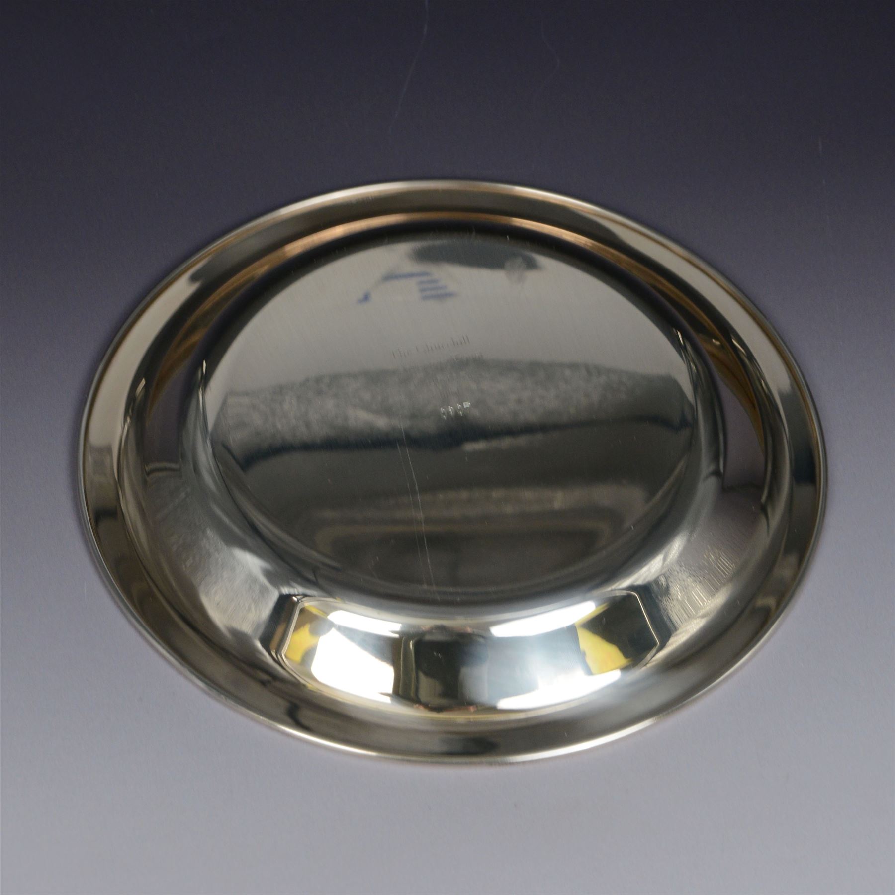 Limited edition silver filled The Churchill Centenary Trust plate, of circular form decorated in low relief with a portrait of Winston Churchill in 24ct gold, hallmarked John Pinches, London 1974, contained within wooden display frame with velvet interior, plate D20.5cm