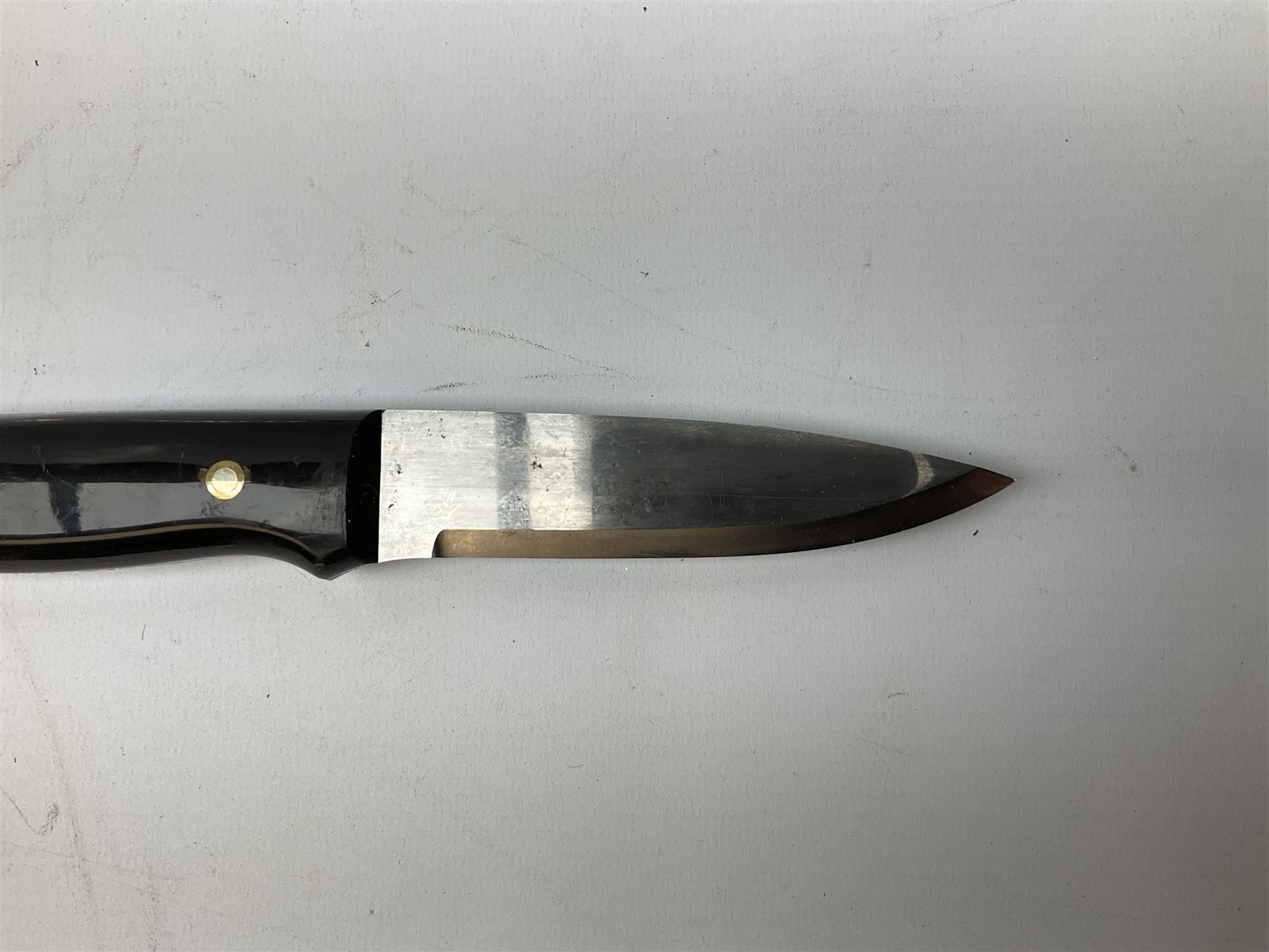 Three hunting knives, each blade marked A. Wright & Sons Sheffield, one with leather handle, one with horn handle and one with antler handle; each with leather sheath (3)