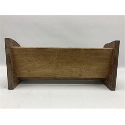 'Mouseman' oak book trough, curved end supports, carved with mouse signature, by Robert Thompson of Kilburn, 