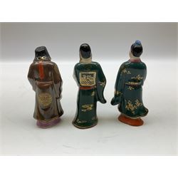 Japanese parquetry puzzle box L12cm; another Japanese puzzle box with marquetry top of Mount Fuji; eleven graduated Chinese figures including immortals; and Chinese figure of a lady standing on a hardwood base next to a horn table (14)