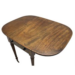 George III mahogany Pembroke table, drop-leaf oval top with satinwood band, fitted with single end drawer, inlaid with satinwood lozenge motifs, on turned and reeded supports with brass cups and castors