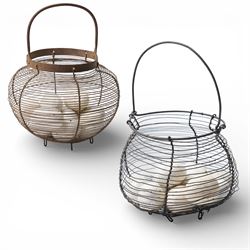 Two wire crocks, each containing 11 broody hen ceramic dummy eggs, four marked 'Caperns'