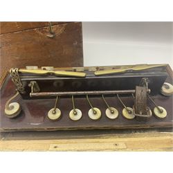 19th Century inlaid rosewood Flutina accordion, stamped Busson of Paris, having sixteen mother of pearl keys and six fold floral decorated bellows L30cm; in baize lined mahogany box