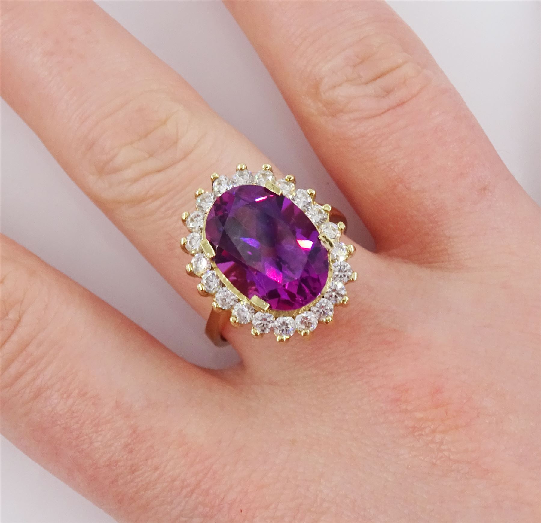 14ct gold synthetic purple sapphire and cubic zirconia cluster ring, stamped 14K