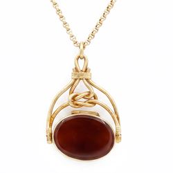 Gold bloodstone and agate opening swivel fob, with knot decoration, Birmingham 1990, on a ...