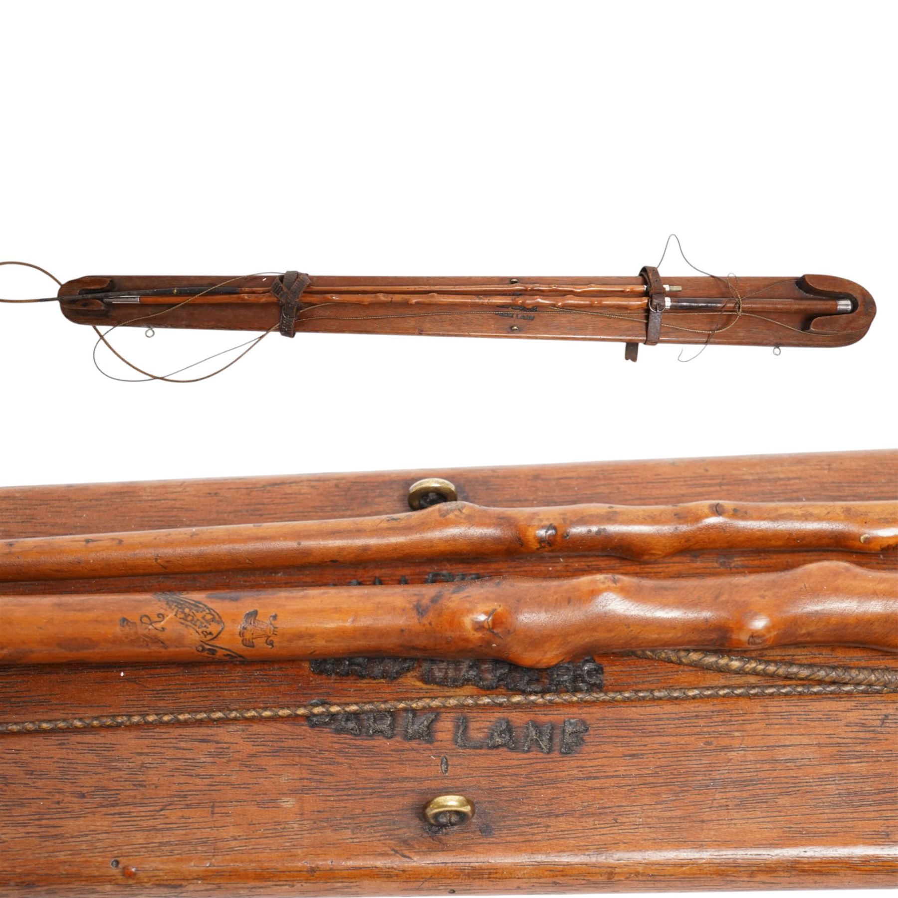 Callow & Son - 19th century travelling coaching whip, the two part yew wood shaft, with silver collars and butt end, hallmarked U & T Walker, London, with leather handle, upon a Callow & Son mount, whip L166cm 