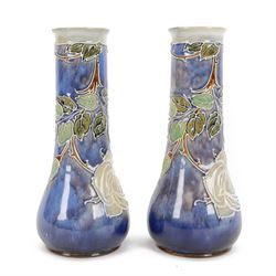 Pair of Royal Doulton stoneware vases by Jane Hurst, decorated roses and foliage, H25cm