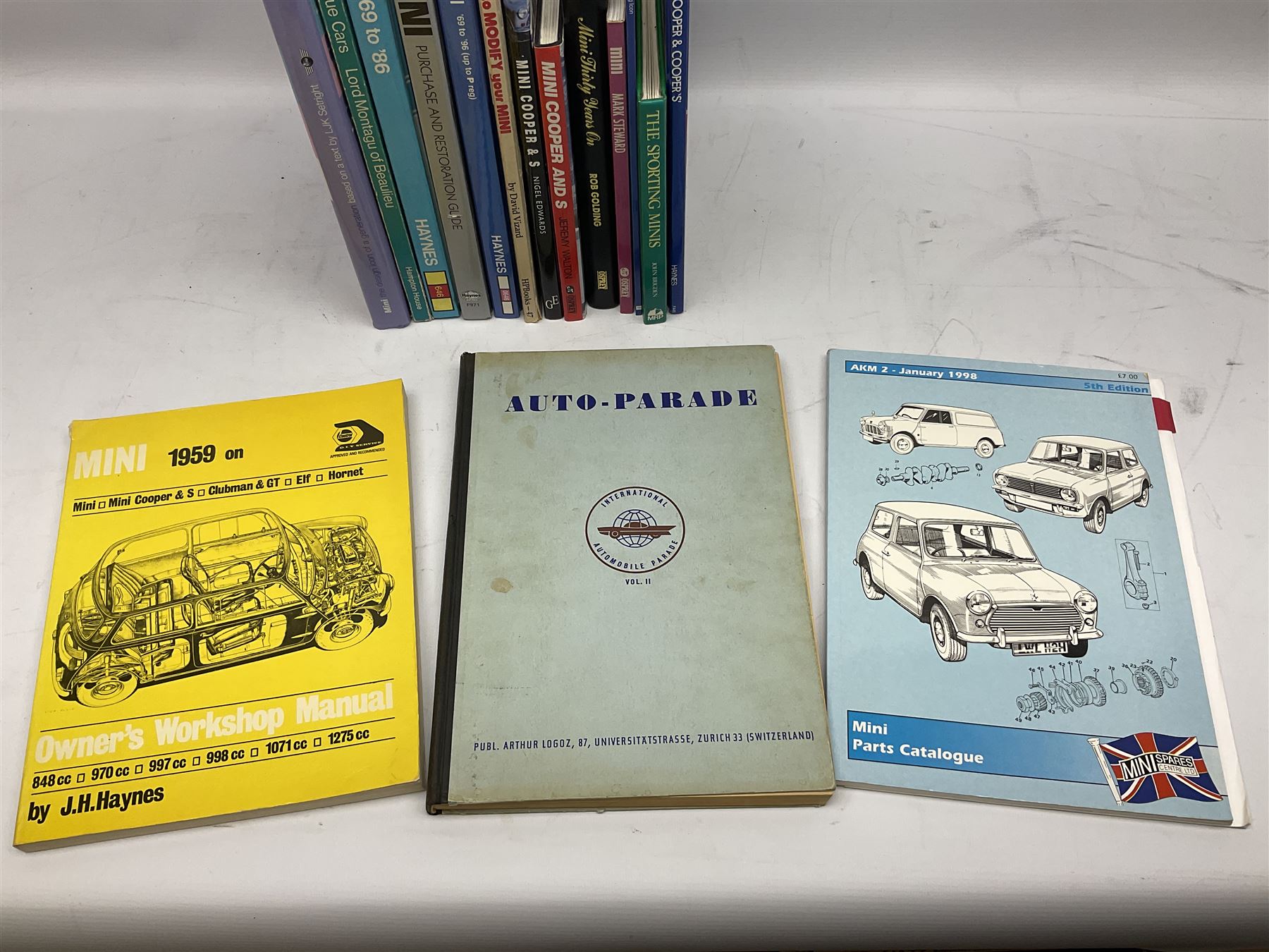 Automobilia - collection of books and ephemera on Mini Cars including BMC Special Tuning Folder for Mini-Cooper 'S', 1972 Handbook, Austin and Morris Mini Cars by Sydney Page 1962, Haynes Manuals, Mechanical Parts Catalogue 1998, thirty and forty years commemorative books, Austin Rover Service and Parts Correspondence Course 1977, video tape and DVD etc (27)