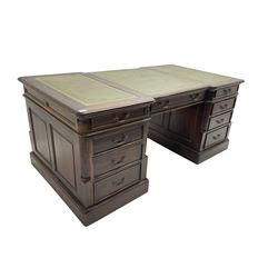 Victorian style mahogany twin pedestal partners desk, green leather inset top with moulded edge, fitted with twelve drawers and two cupboards, fluted quarter columns on a plinth base