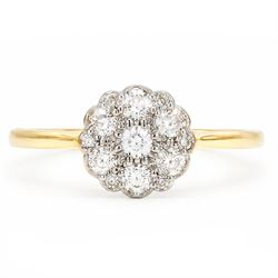 Early 20th century diamond daisy cluster ring, milgrain and bead set with thirteen old cut...