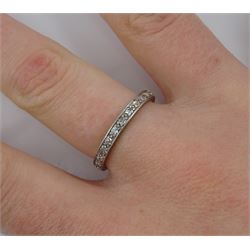 Early-mid 20th century platinum diamond full eternity ring, with engraved decoration sides