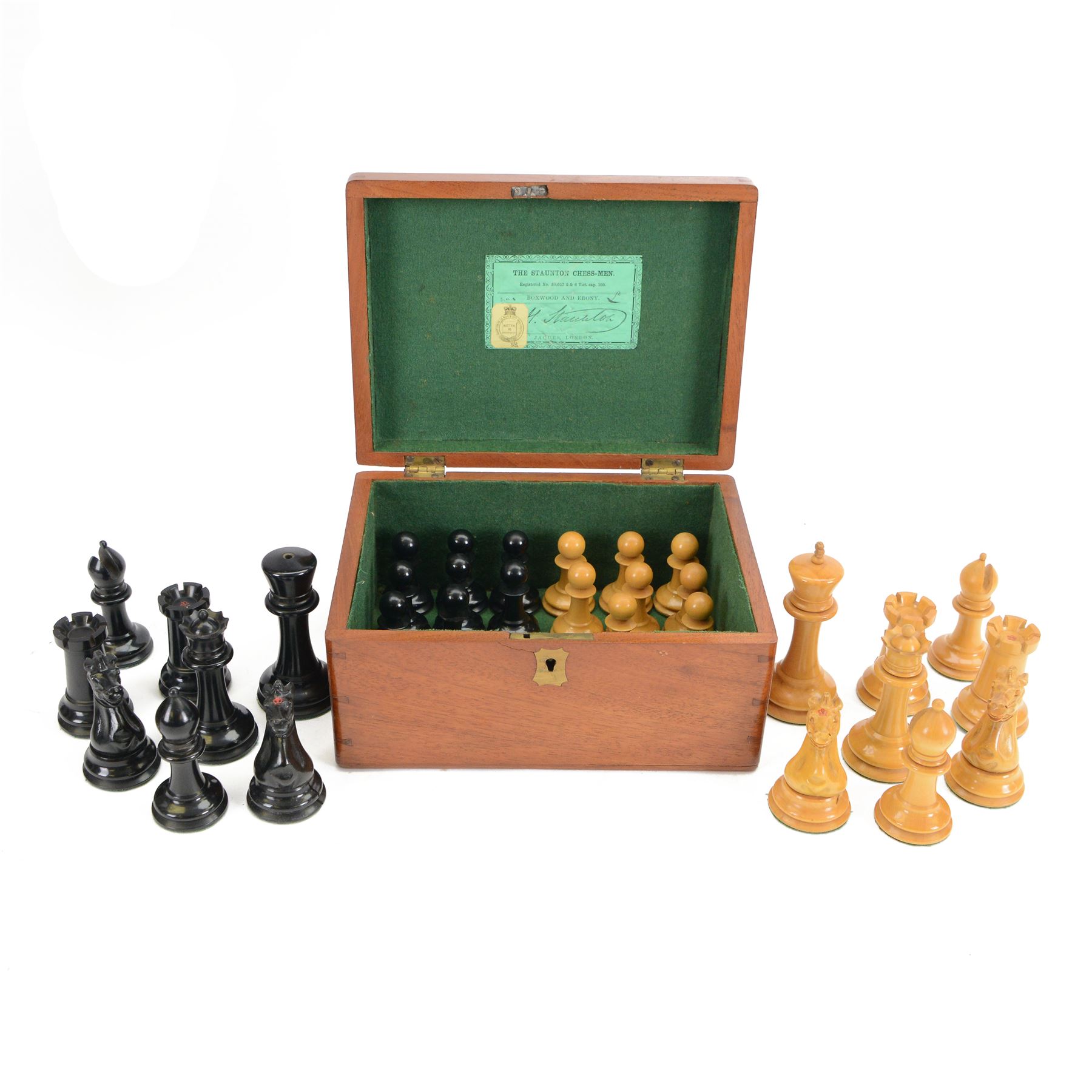 Jaques 'The Staunton Chess-Men' boxwood and ebony chess set, in original brass mounted mahogany box with paper label to interior, only the boxwood king stamped Jaques London, some pieces marked with red crown, boxwood king H11cm