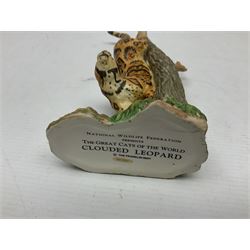 Ten Franklin Mint National wildlife Foundation Big Cats of the World figures to include, White Bengal Tiger, Jaguar, Cougar, Cheetah, Clouded Leopard etc, with display stand