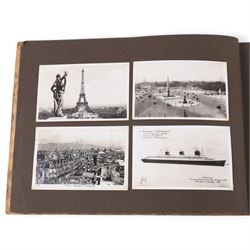 Two early to mid 20th century postcard albums, containing black and white and colour postcards of France, Turkey and Egypt, together with some personal photographs and newspaper clippings