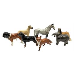 Beswick figures, comprising Afghan Hound 2285, St Bernard 'Corna Garth Stroller' 2221, Rottweiler 3056, Greatdane 'CH Ruler of Ouborough', Fox, Elephant, and dappled grey type horse. 
