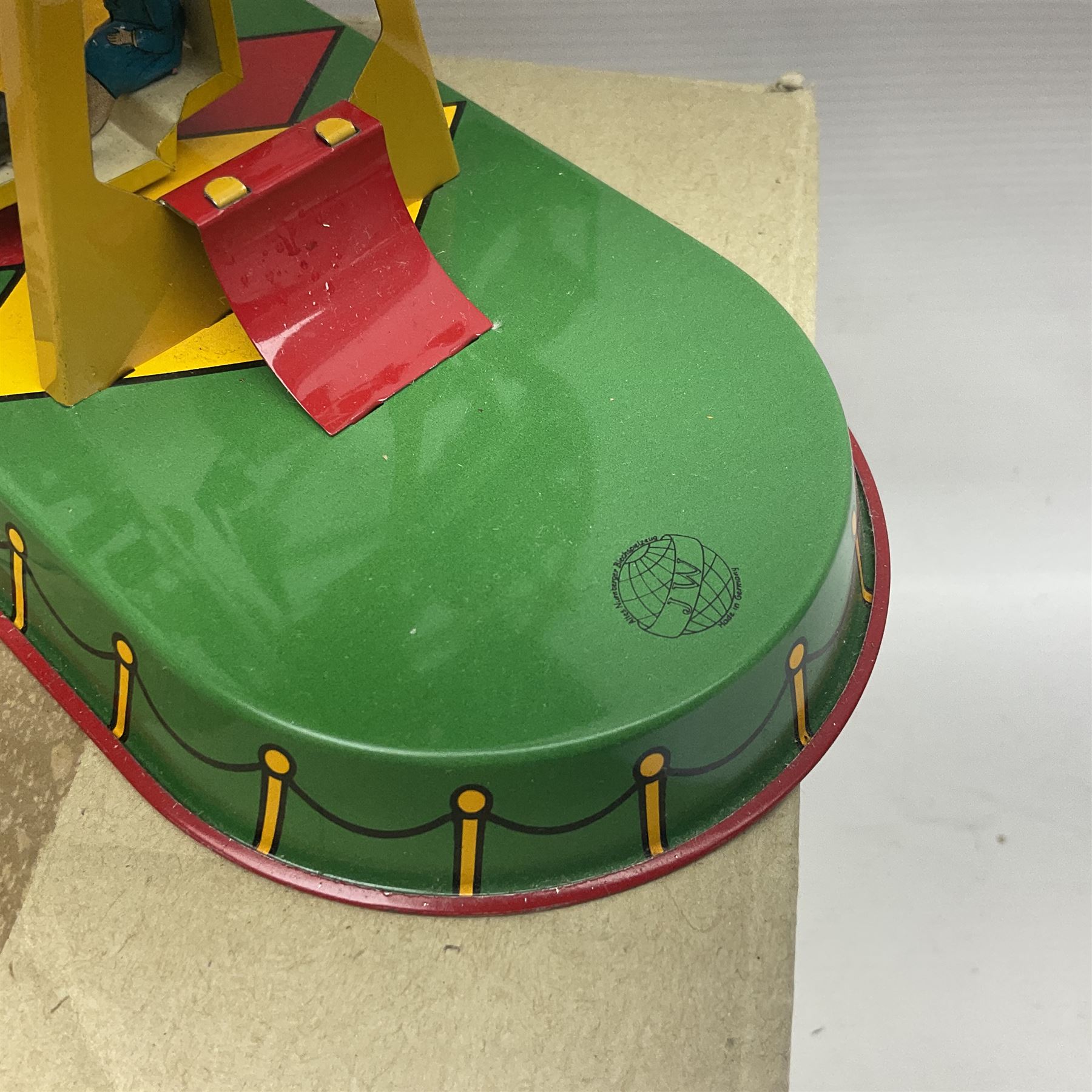 Twenty six tinplate models to include Ferris Wheel and Performing Circus Elephant, marked JW, further similar examples such as Duck on a Bike, Clown on Roller, Carousel; Popeye Tin Speedboat; Looney Tunes Wind Up Cars and Express Train; various international examples, MS107 Jumping Bambi, Pop Pop Boat, jumping frogs, pecking chickens etc; both boxed and loose