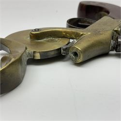 19th Century percussion eprouvette or gunpowder tester, with foliate engraved brass box lock and calibrated ratcheted wheel, steel trigger guard and walnut bag butt, L14cm