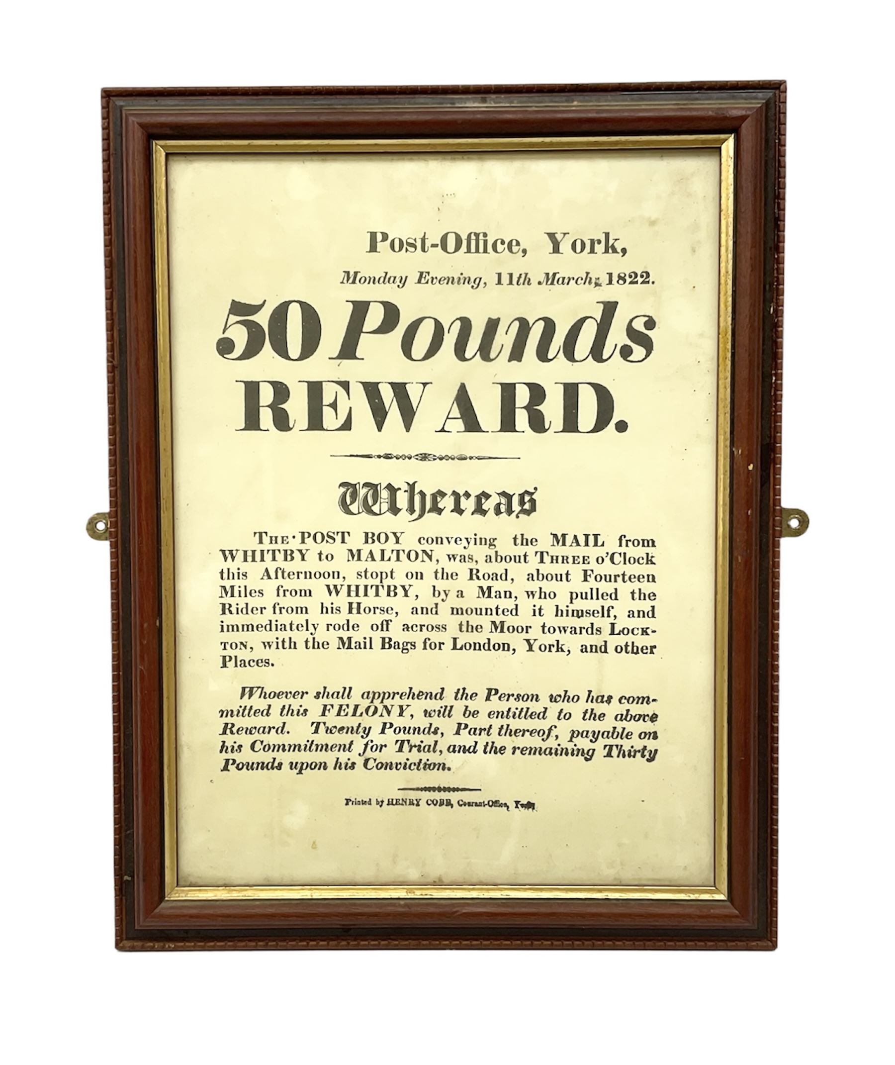 Early 19th century framed local interest York Post Office wanted poster, £50 reward, printed by Henry Cobb dated Monday Evening, 11th March 1822, requesting information about a post boy conveying mail from Whitby to Malton who was pulled from his horse by a thief who stole mail bags for London and York, H44cm