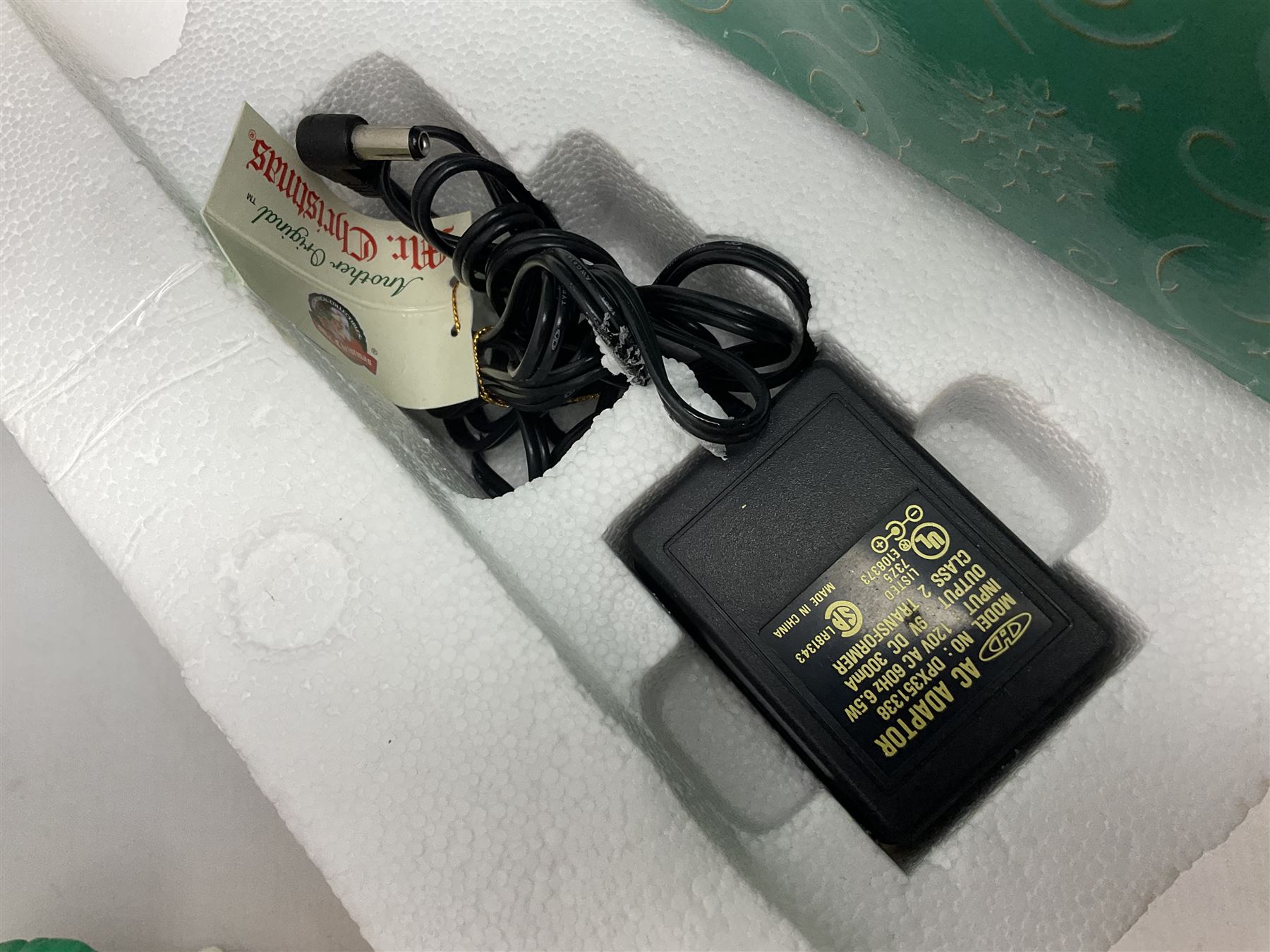 Six Disney Winnie the Pooh Christmas snow globes, comprising large Mr Christmas Holiday Snowfall, An Enchanted Christmas, It's A Small World Christmas 1994,  Tree Trimming, 1995 Christmas At Our House and Christmas Band Concert, together with Mr Christmas Holiday Go Round, all with boxes (7)