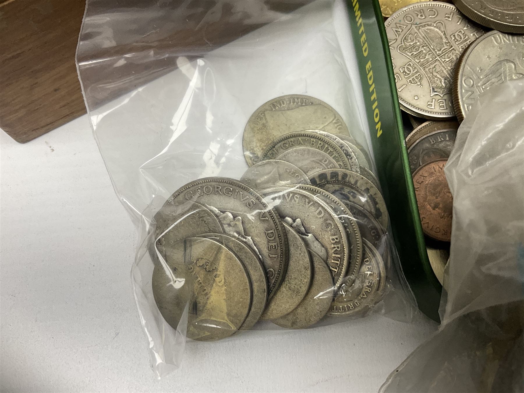 Great British and World coins, including a small number of pre 1920 silver coins, pre-decimal pennies, commemorative crowns, various part filled 'The London Mint Office' commemorative coin folders, Britain's First Decimal Coins sets in blue folders, pre-Euro coinage, United States of America coins etc