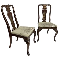 Pair of 20th century Chinoiserie hardwood lacquered hall chairs, the shaped splat and apron painted with gilt traditional scenes and birds, seat upholstered in floral and bird patterned fabric, raised on cabriole supports with inner c-scrolls