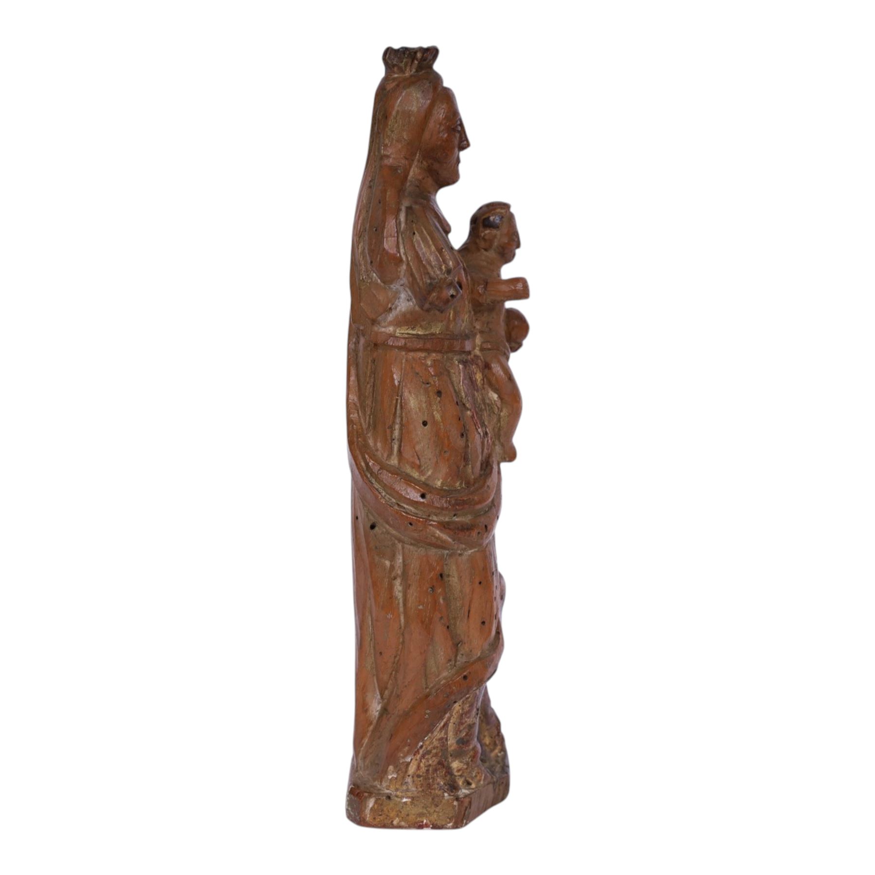 17th century carved limewood figure of a saint, with traces of original gilding, H22.5cm