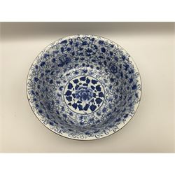 Large Chinese blue and white bowl with painted interior and exterior foliate design with interior central circular medallion enclosing a peony among foliage, with metal mounted rims, W37.5cm H15cm