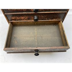 Early 20th Century Dewhurst table top chest, decorated with gilded 'Dewhurst's Sylko Machine Twist Strong Lustrous' lettering above six long drawers with names and numbers of cotton also detailed in gilt, H39cm