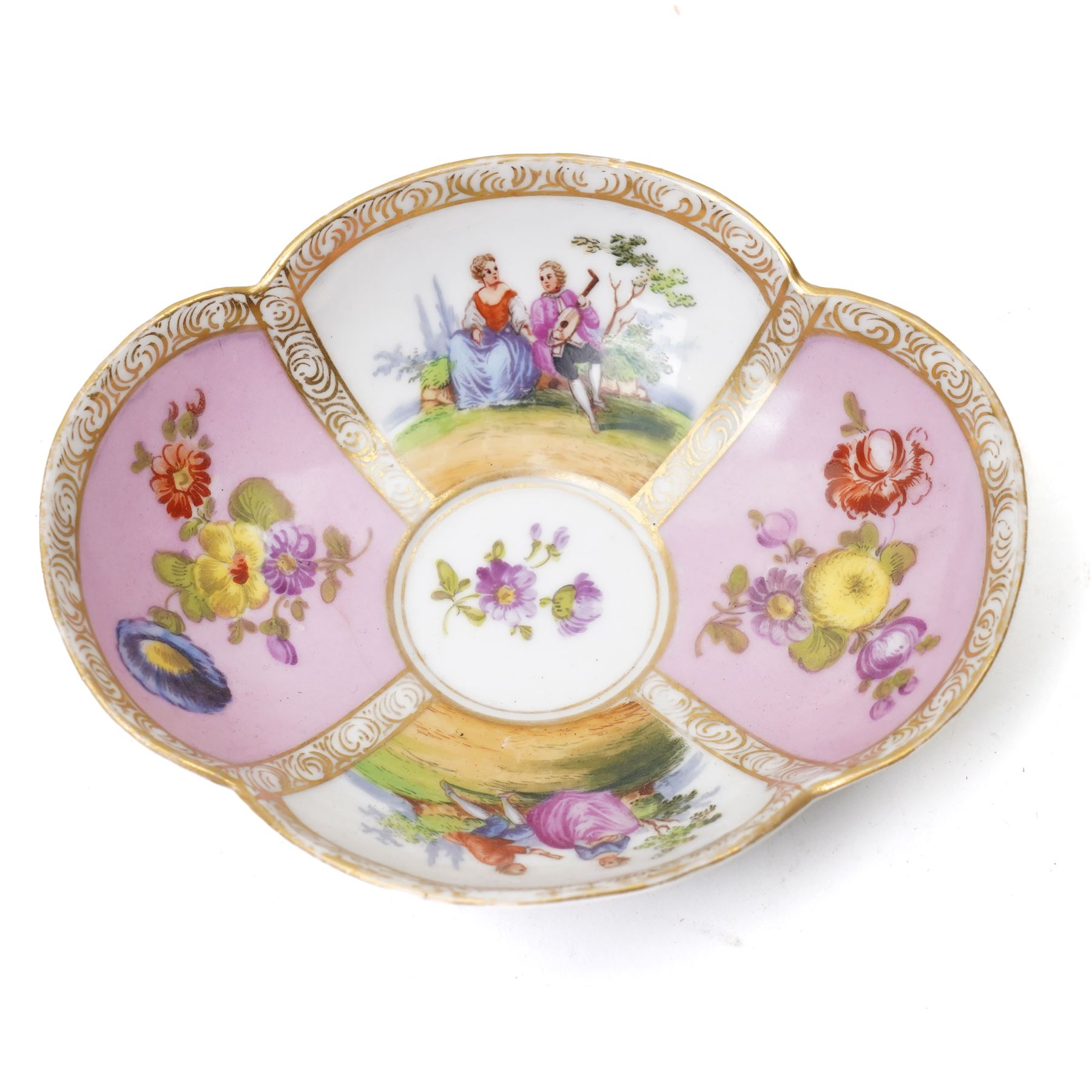 Two 19th century Dresden quatrefoil twin handled chocolate cups and saucers, decorated with Watteau style panels, with pink and yellow floral ground and gilt heightened decoration, blue 'AR' mark to underside for Helena Wolfsohn (2)