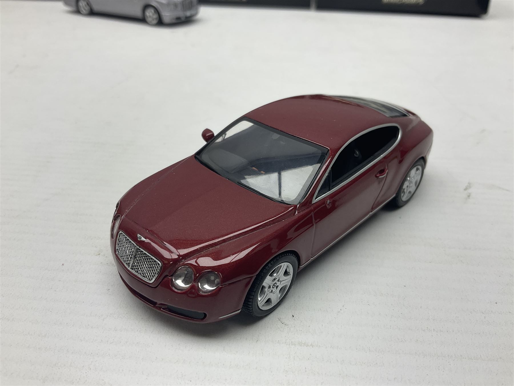 Nine Paul's Model Art 'Minichamps' 1:43 scale die-cast models - six boxed Bentleys and two unboxed Bentleys; and a Bedford estate van (9)