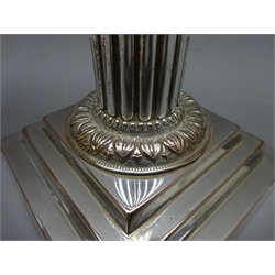  Pair late 19th century silver-plated Corinthian column shaped candlesticks on stepped bases, H20cm (2)   