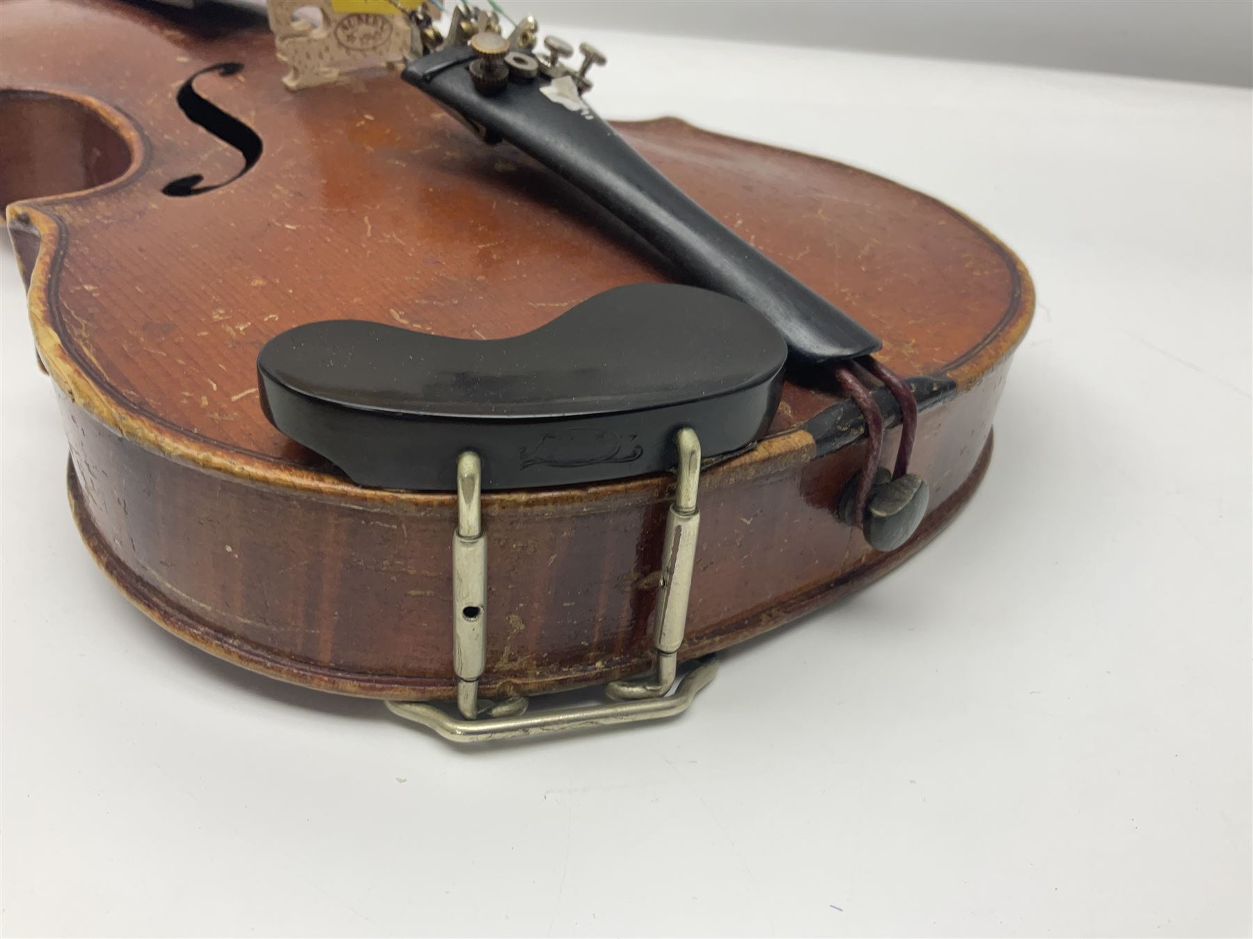 Early 20th century German Saxony three-quarter size violin with 34cm one-piece maple back and ribs and spruce top L55.5cm overall; in ebonised wooden 'coffin' case with bow
