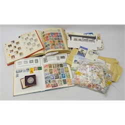  Collection of Great British and World stamps in three albums and loose including some mint blocks of stamps, stamps relating to The Royal Family, Aden, Australia, Bahamas, Belgium, Colombia, Malaya, Greece etc  