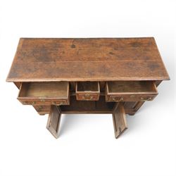 George III oak dresser base, rectangular top with moulded edge, three fielded panelled drawers with brass swan neck handles, over four fielded panelled front with the central two cupboard doors, raised on stile supports