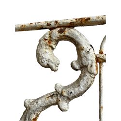 Regency design wrought metal garden bench, central lyre back with foliate S-scrolls with serpent masks, flanked by two floral mouldings and further scrolling, metal slatted seat on straight supports joined by H-stretcher  - THIS LOT IS TO BE COLLECTED BY APPOINTMENT FROM DUGGLEBY STORAGE, GREAT HILL, EASTFIELD, SCARBOROUGH, YO11 3TX