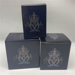 Three Royal Crown Derby paperweights, comprising Moonlight Badger, Puffin and Spotty Pig, all with gold stopper, printed mark beneath and original box