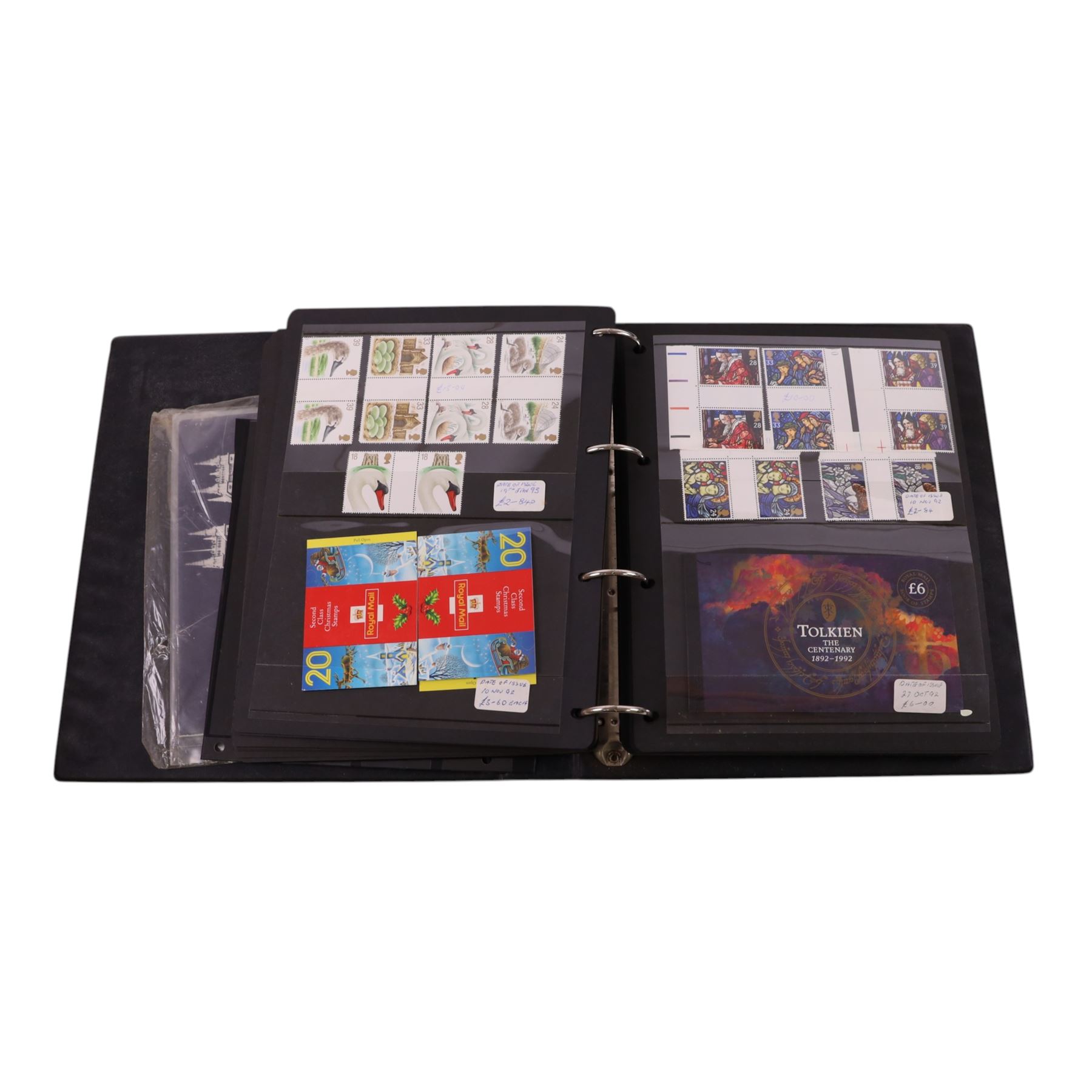 Queen Elizabeth II mint decimal stamps in four folders, face value of usable postage approximately 650 GBP