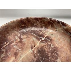 Pink veined marble bowl, of circular form, upon a spreading circular foot H12cm D22