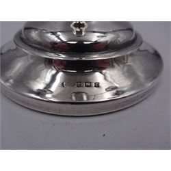 Modern silver mounted three branch candelabra, the tapering stem supporting a central candle holder and two removable curved branches with candle holders, upon spreading circular foot, hallmarked Birmingham 1968, maker's mark worn and indistinct, H25.5cm