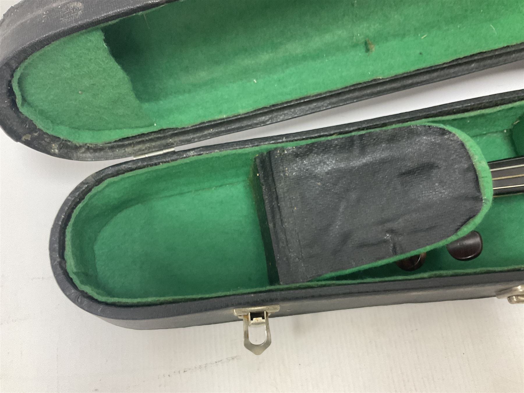 19th century full sized violin in a later hard case, decorative mother of pearl inlay to the tail piece Overall length 60cm No bow