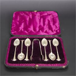 Set of six late Vitorian silver spoons and sugar tongs, each with twist and scroll handles...